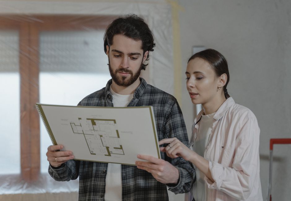 UK couple choosing between air source and ground source heat pump